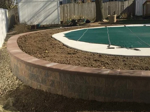 Planter bed wall around a pool deck