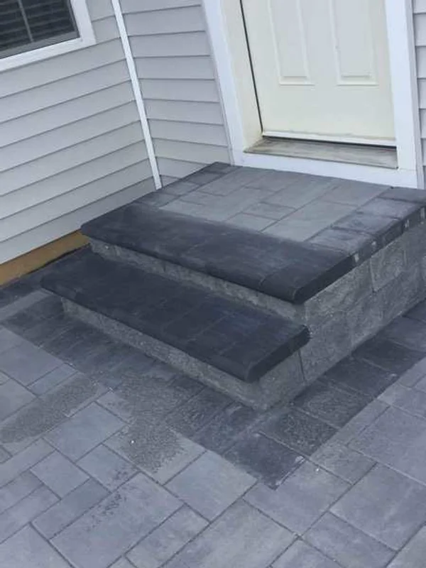 Natural stone walkway with curved steps.